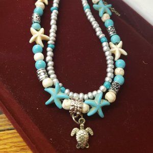 Pretty Beach theme Turquoise colored starfish Turtle charm layered bracelet